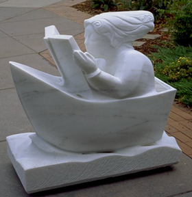 image of a young girl sitting in a boat in the moonlight reading a book